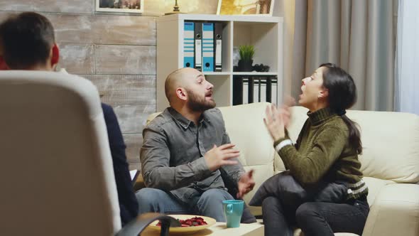 Zoom in Shot of Young Couple Fighting at Relationship Counseling alt