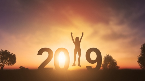 Silhouette Young Woman Jumping To 2019 New Year