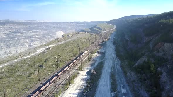 Upper View Empty Freight Train on Railway at Asbestos Quarry alt