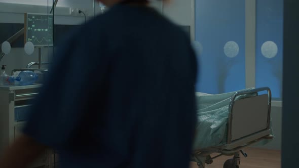 Sick Patient Sleeping in Hospital Ward Bed at Health Facility alt