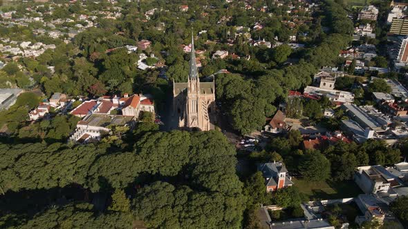 Aerial of San Isidro Cathedral and revealing La Plata river and Buenos Aires city on background alt