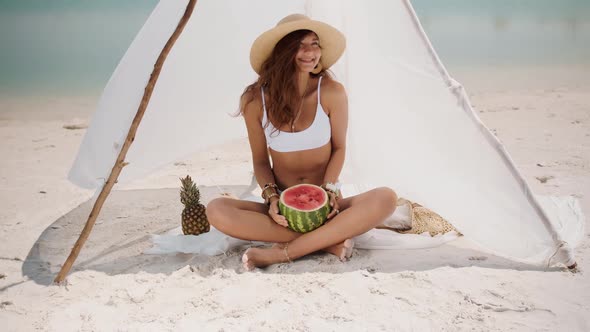 Woman on the Tropical Beach Eating Watermelon alt