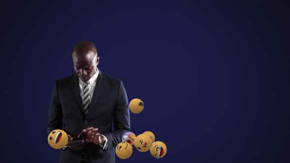 African American using smartphone with emoticons spawning alt