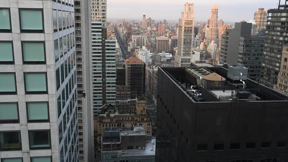 TImelapse of Manhattan, New York City, USA.  Day to night view of Upper East Side from the penthouse alt