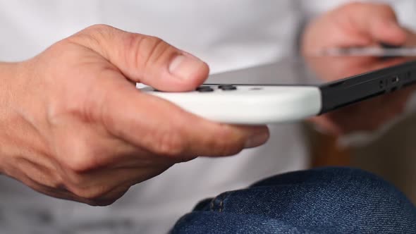 Man Playing Video Game Console