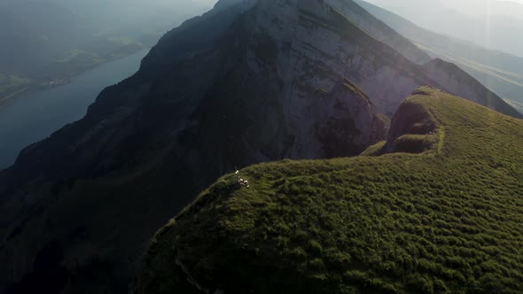 Aerial view of Augstmatthorn mountain with low clouds, Bern, Switzerland. alt