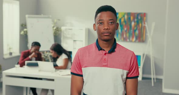 Portrait of Young Man with Dark Eyes Hair Black Skin Beautiful Wide White Smile Man is Wearing alt