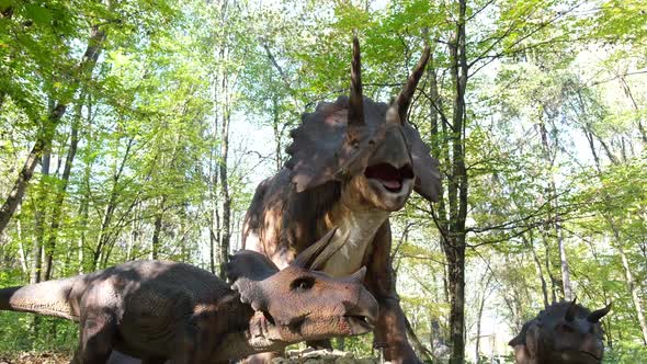 Dinosaur Among the Trees in the Park alt