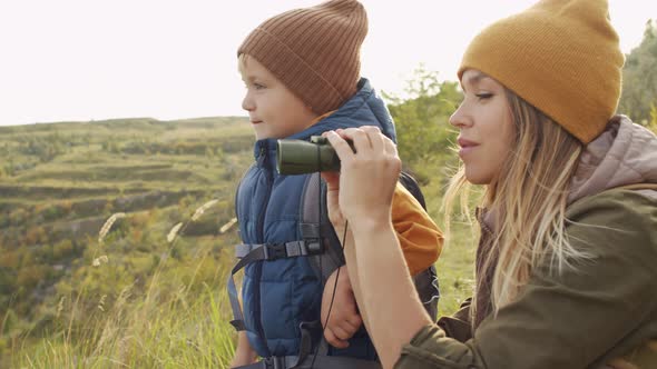 Woman and Boy Enjoying Nature alt
