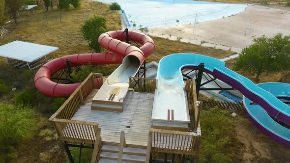 Drone shot of water slides at abandoned waterpark Breakers in Tucson Arizona alt