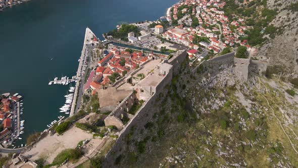 Aerial Shot of the Fortress St John San Giovanni Over the Old Town of Kotor the Famous Tourist Spot alt