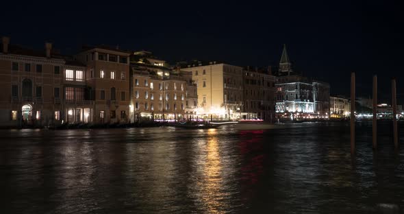 Timelapse of Grand Canal and buildings, at night