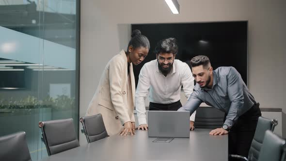 Multinational Group Business Team Three Coworkers Win with Laptop Online Trade Growth Stack Hands alt