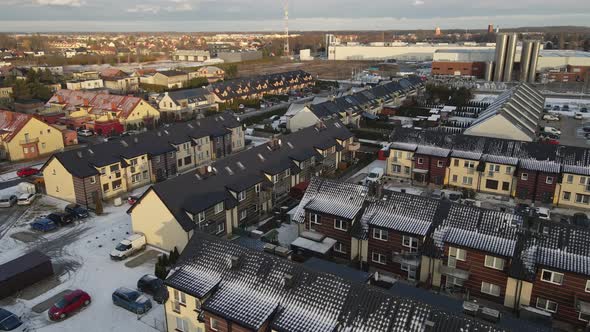 Aerial View of Small European City with Modern Residential Suburb Neighborhood alt