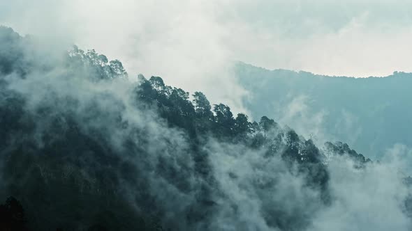 Clouds moving over the hills in Mussoorie, Uttarakhand, India alt