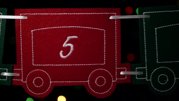 Advent calendar in the form of toy train used to count the days in anticipation of Christmas