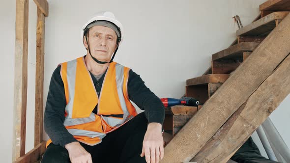 Portrait of mature man constructor. Designer worker. Renovation concept. Building new house or apart alt