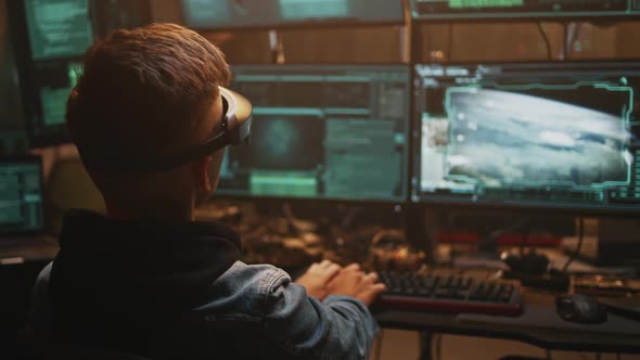 Male Hacker Launching Nuclear Warhead alt