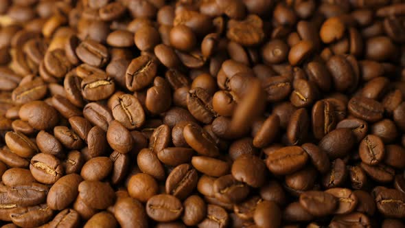 Coffee beans falling in slow motion