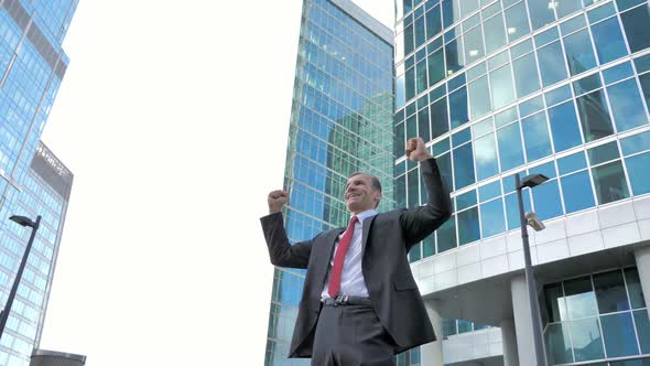Middle Aged Businessman Celebrating Win Successful alt