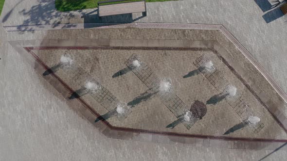 Fountain Top View. Sultry Summer Day, Freshness and Coolness By the Fountain alt