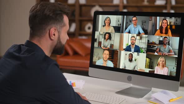 Bearded Man in Formal Wear Using App for Distance Video Communication with Coworkers alt