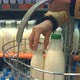 Bottled Milk on Shelf in Store - VideoHive Item for Sale
