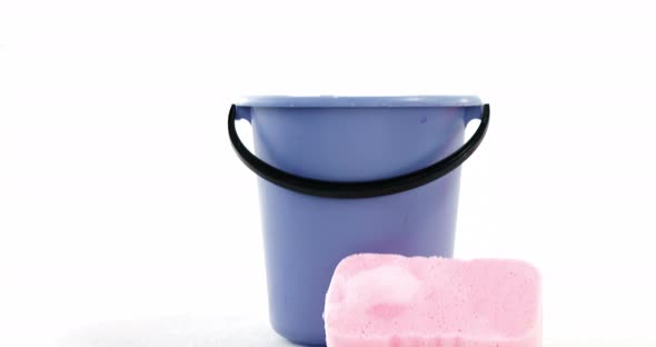 Cleaning sponge and plastic bucket alt