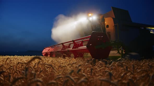 Night Harvesting with a Combine Ukrainian Combine Harvests Wheat Farmers in Ukraine alt