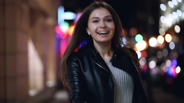 Woman Walking at The Night City