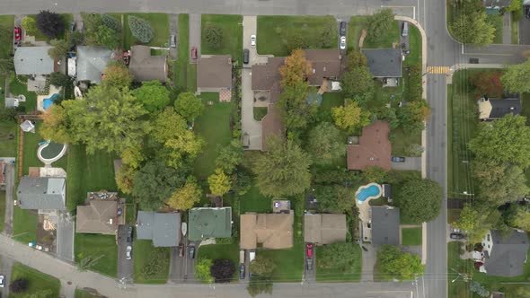 Straight overhead drone shot of typical American city residential neighborhood alt