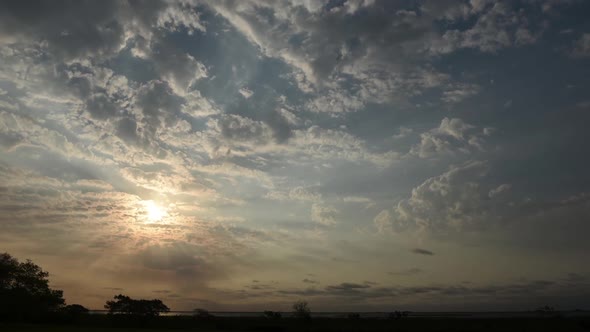 Time lapse of dramatic evening sky alt