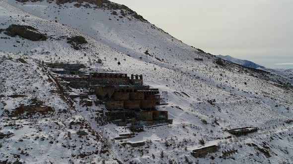 Built into the side of a mountain in 1920 on the southern end of Genola, Utah, the Old Tintic Mill p alt