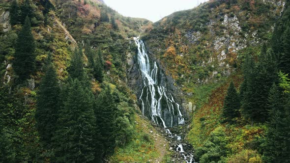 Aerial drone view of nature in Romania. Balea waterfall located in Carpathian mountains alt