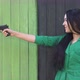 Pistol in Hands of Girl. - VideoHive Item for Sale