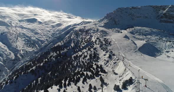  snowy mountains landscape and movement of clouds in winter