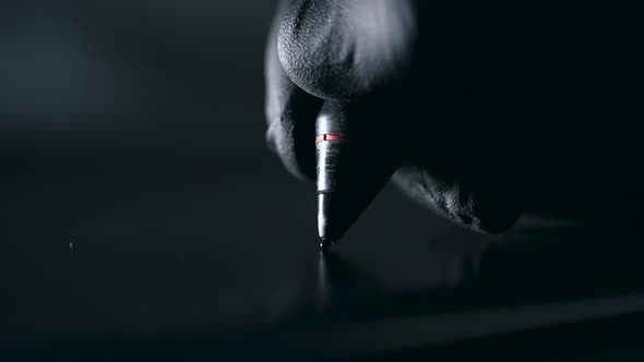 Black Pen on a Black Background Close-up