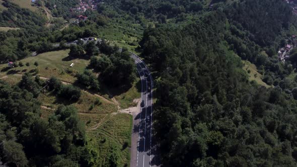 An Aerial Drone Landscape of a Road and a City in Transylvania