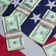 Packs Of Dollars On The Flag Of America - VideoHive Item for Sale