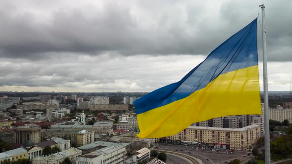 Flag of Ukraine, Kharkiv city center cloudy aerial