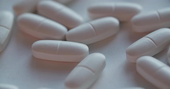 White Medical Pills On White Background