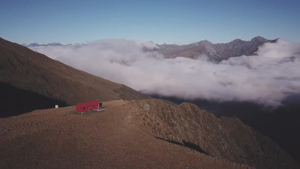 Beautiful mountain hut aerial footage