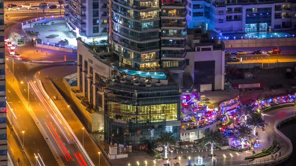 Luxury Dubai Marina Canal and Promenade Night Timelapse Dubai United Arab Emirates alt