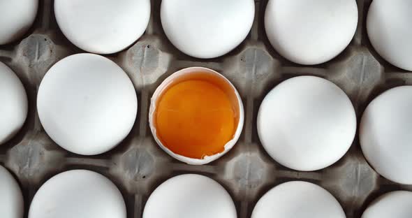 One Raw Egg Without a Shell Slowly Rotates. alt