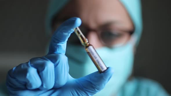 Doctor holding a recipient with the coronavirus COVID-19 vaccine