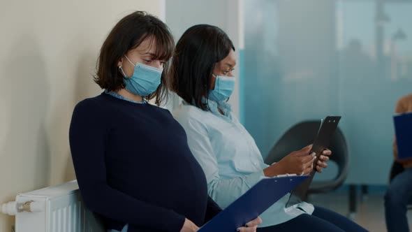Woman Expecting Child and Waiting to Join Executive Job Interview alt