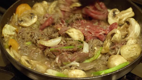 Cooking Korean Beef Hot Pot. Korean Food Bulgogi Jeongol. close up alt