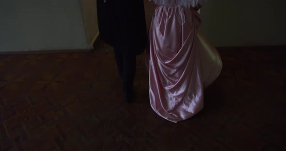 Beautiful 18Th Century Couple Is Walking in a Beautiful Palace in the Evening  alt