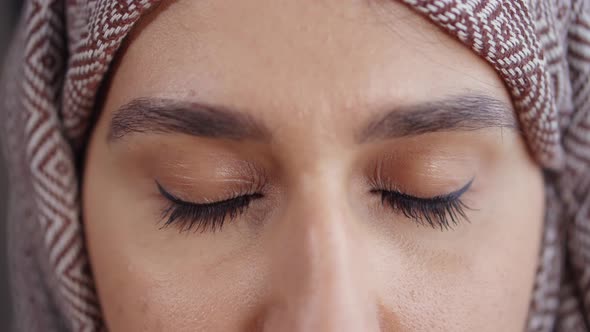 Arabic Woman Is Opening Her Dark Eyes, Extreme Close-up View of Sight alt