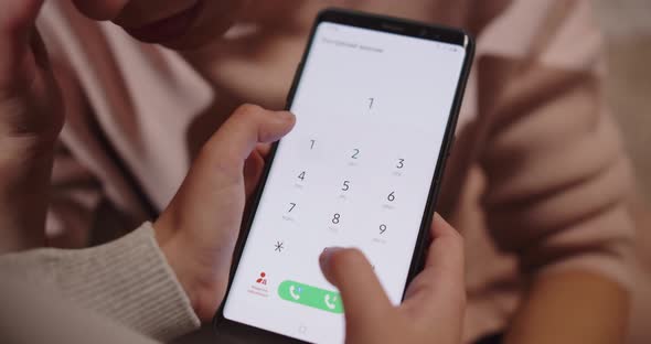 The Child Calls The Police From The Mobile, And The Mother Sits Next To Him And Cries alt